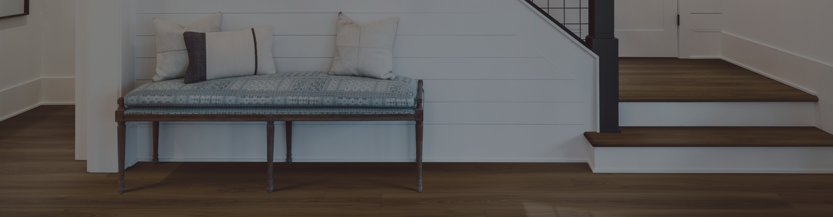 rustic look hardwood flooring in entryway staircase